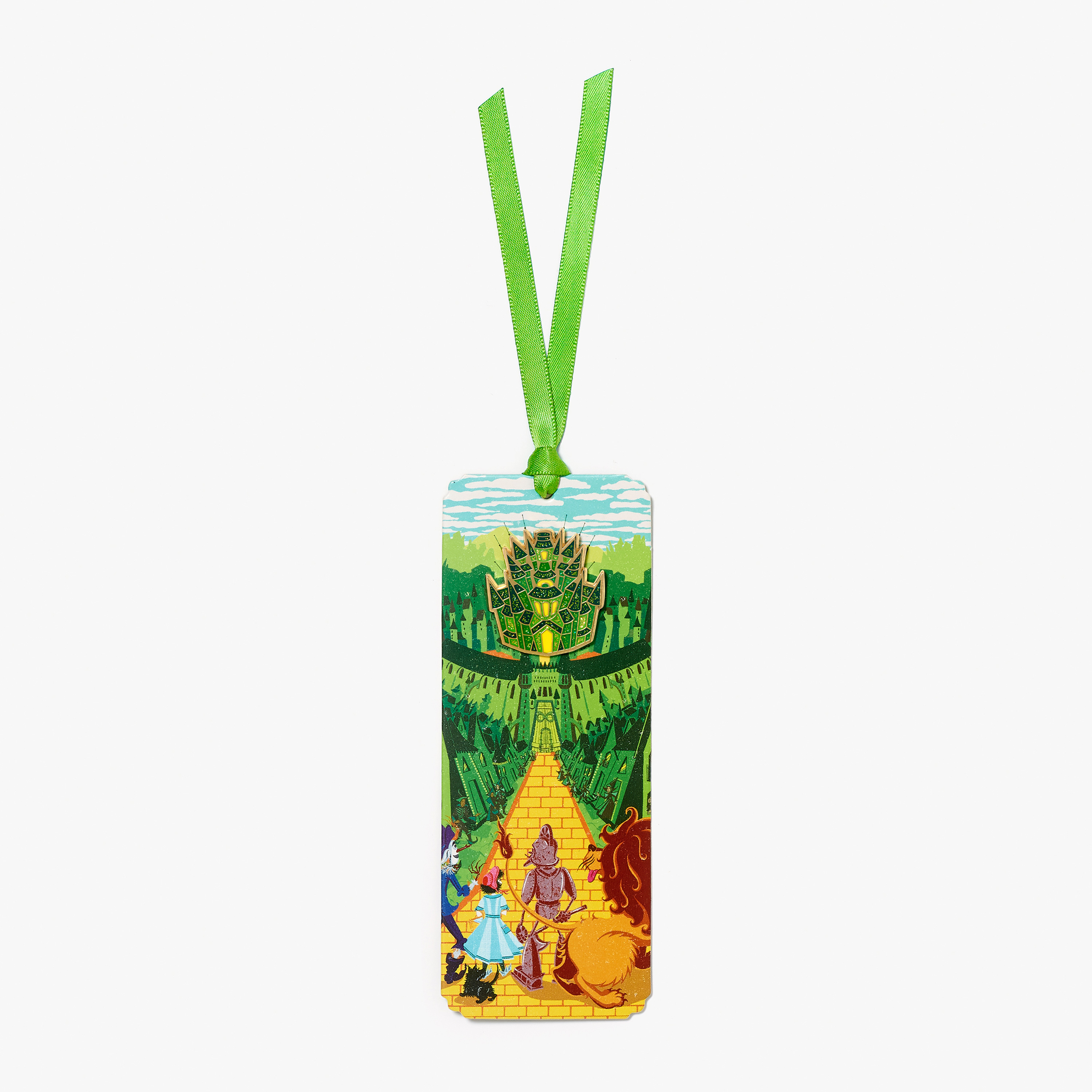 Bookmark and pin badge duo featuring Yellow Brick Road to the Emerald City design inspired by MinaLima Classics illustrated edition of ‘The Wonderful Wizard of Oz’.