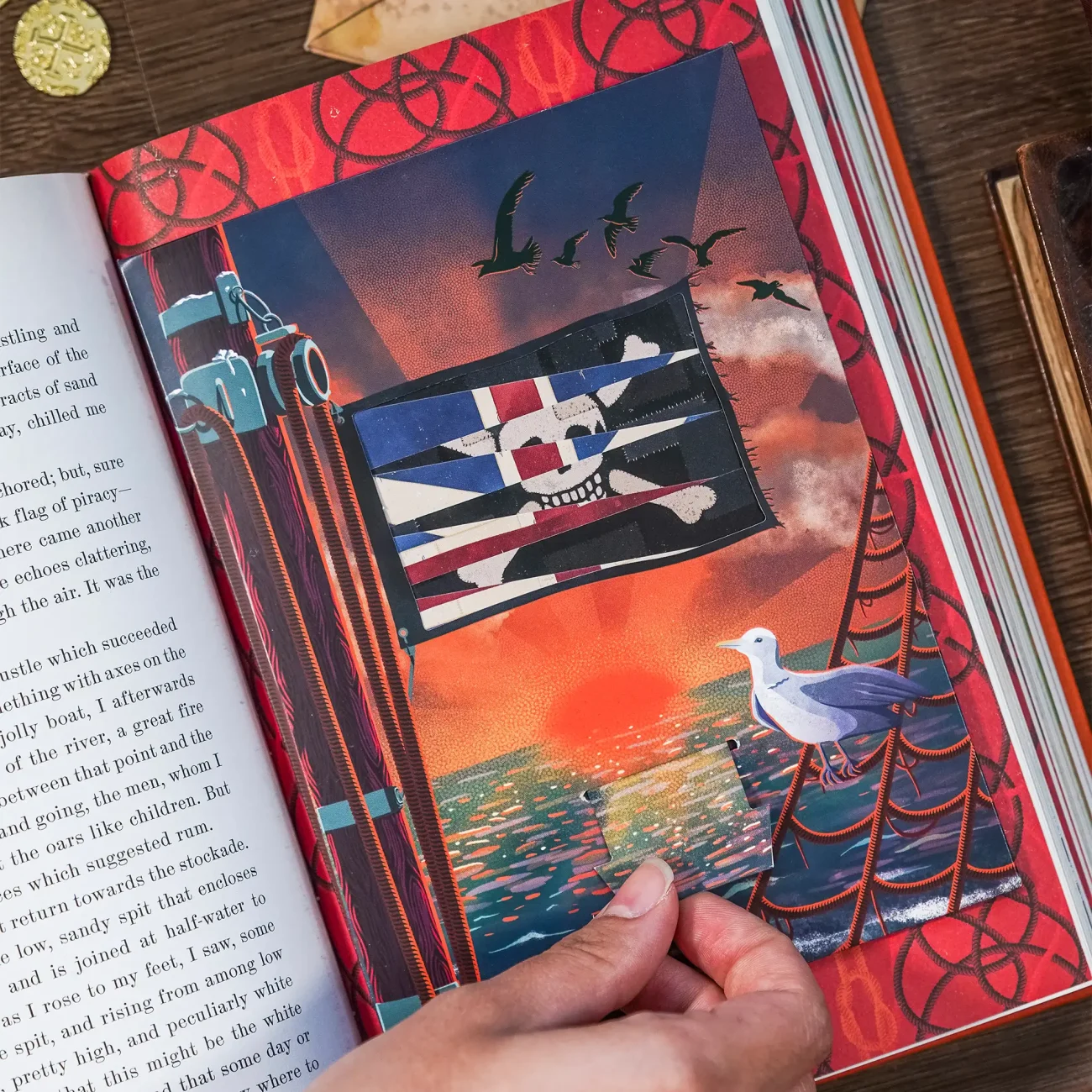 Treasure Island by Robert Louis Stevenson deluxe edition illustrated by MinaLima (flag paper-engineered element)