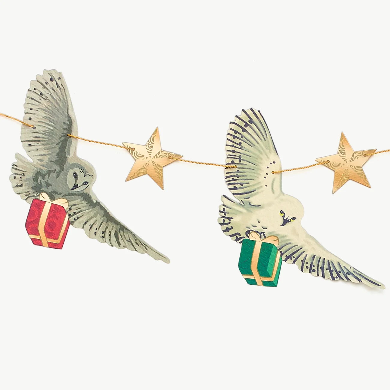 Harry Potter Hogwarts paper hanging garland featuring stars and owls bearing gifts