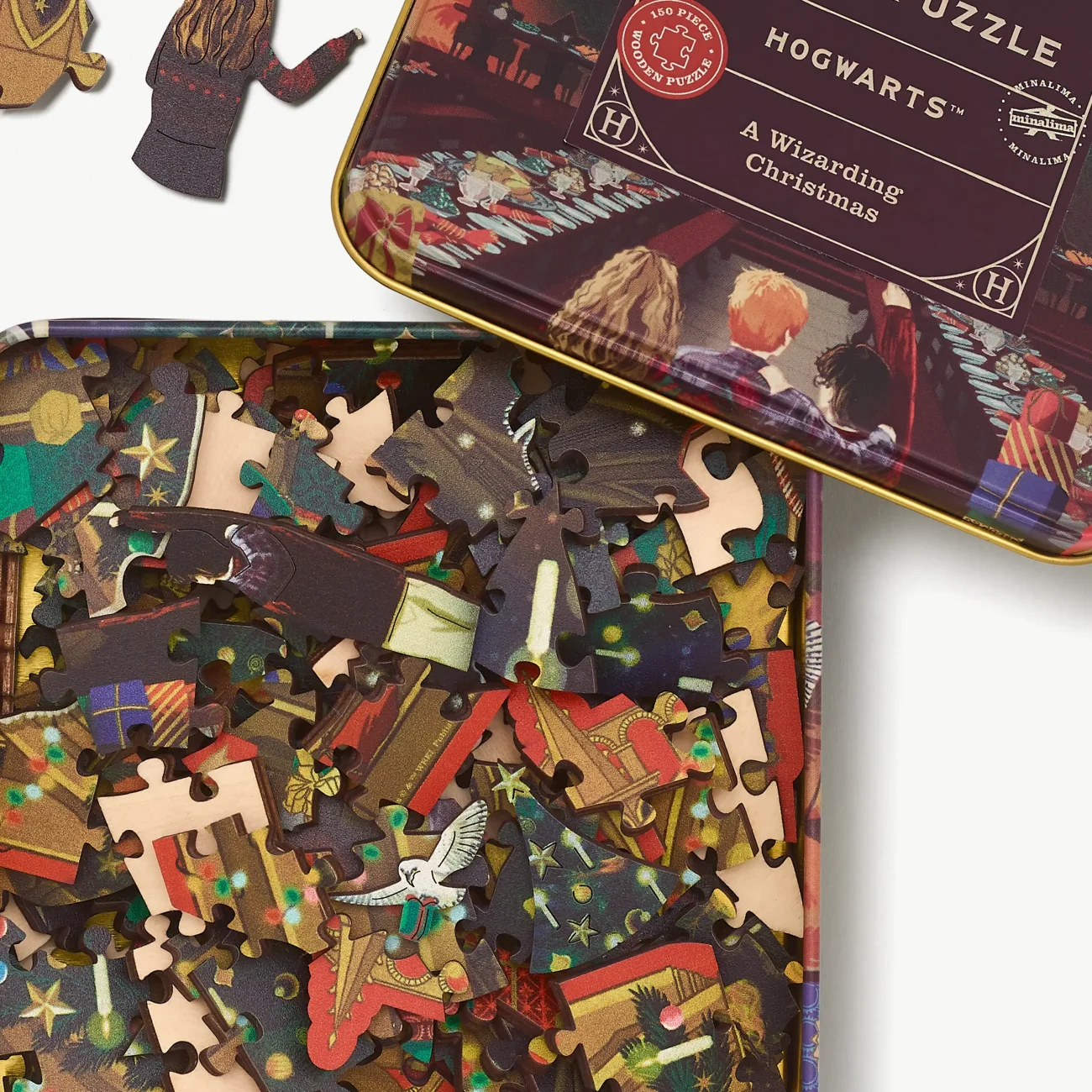 Hogwarts 'A Wizarding Christmas' Harry Potter wooden jigsaw puzzle - close-up view of contents in box